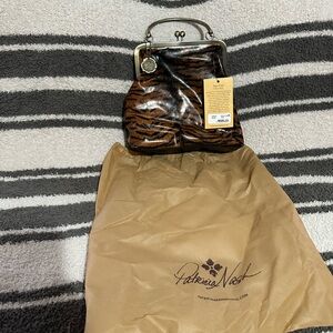 NWT Patricia Nash 10th Anniversary Kiss Lock Novella Vintage Collection 
 “Tiger